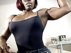 Ebony girl bodybuilder shows her massive